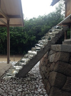 A set of stone stairs at a shrine