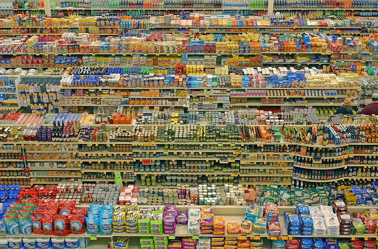 high angle photograph of colorful, well-stocked supermarket shelves